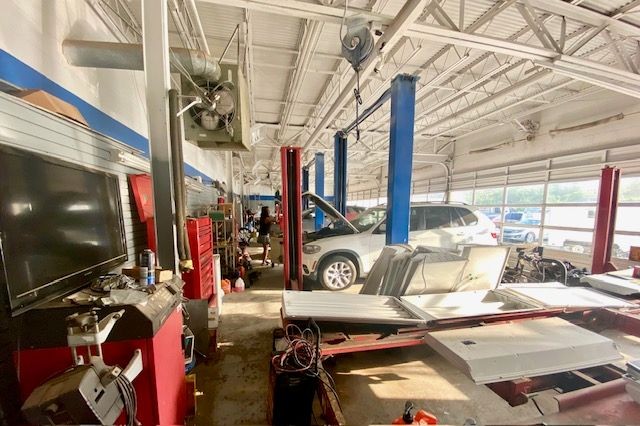 6 Lifts  and an Alignment Shop